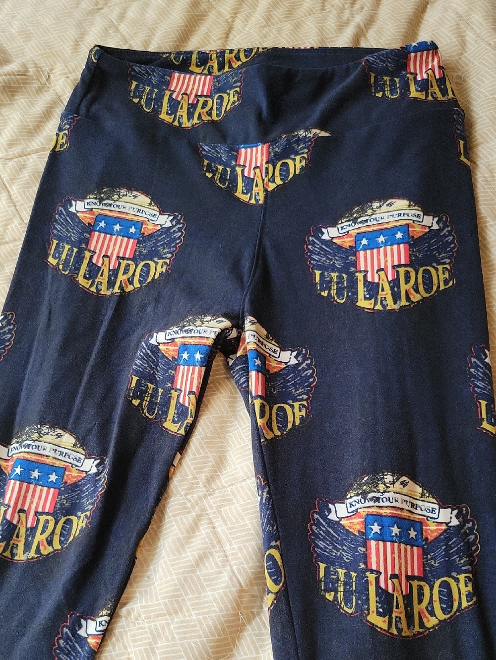 LuLaRoe Navy Pajama Bottoms with Red, White & Gold Logo Print
